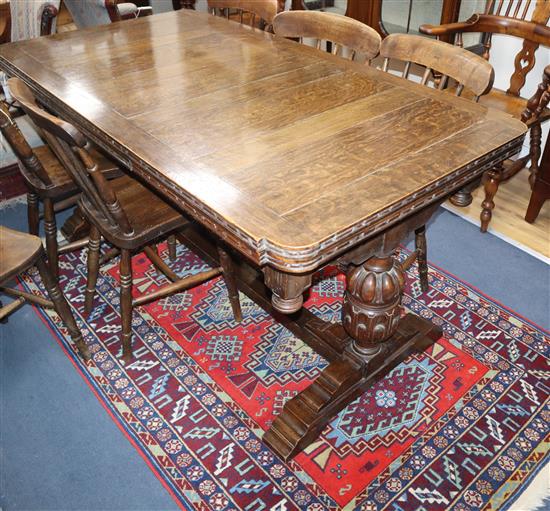 A 1930s oak draw leaf refectory table L.153cm